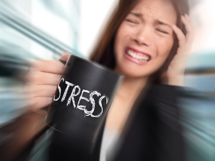 Stress - business person stressed at office