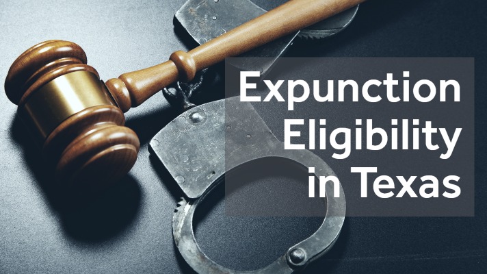 gavel and metal handcuffs on grey table with the text "expunction eligibility in Texas"