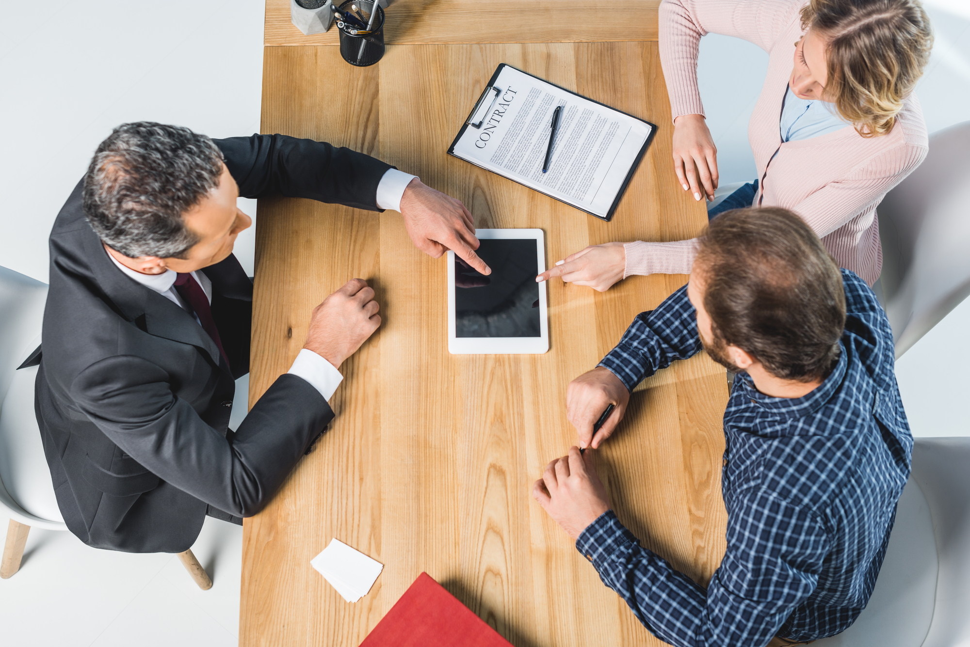 Man and woman meeting with an attorney